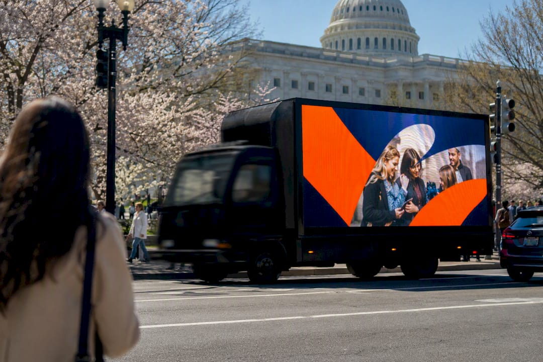 Mobile billboard truck on DC city street