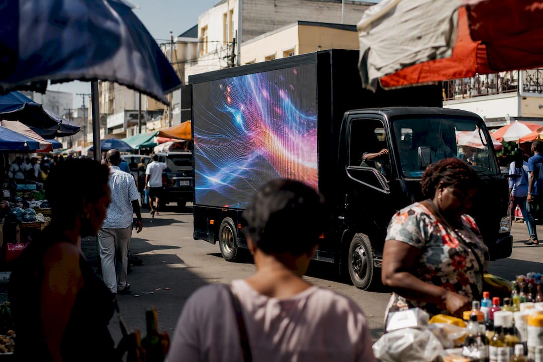 Mobile LED billboard truck on city street