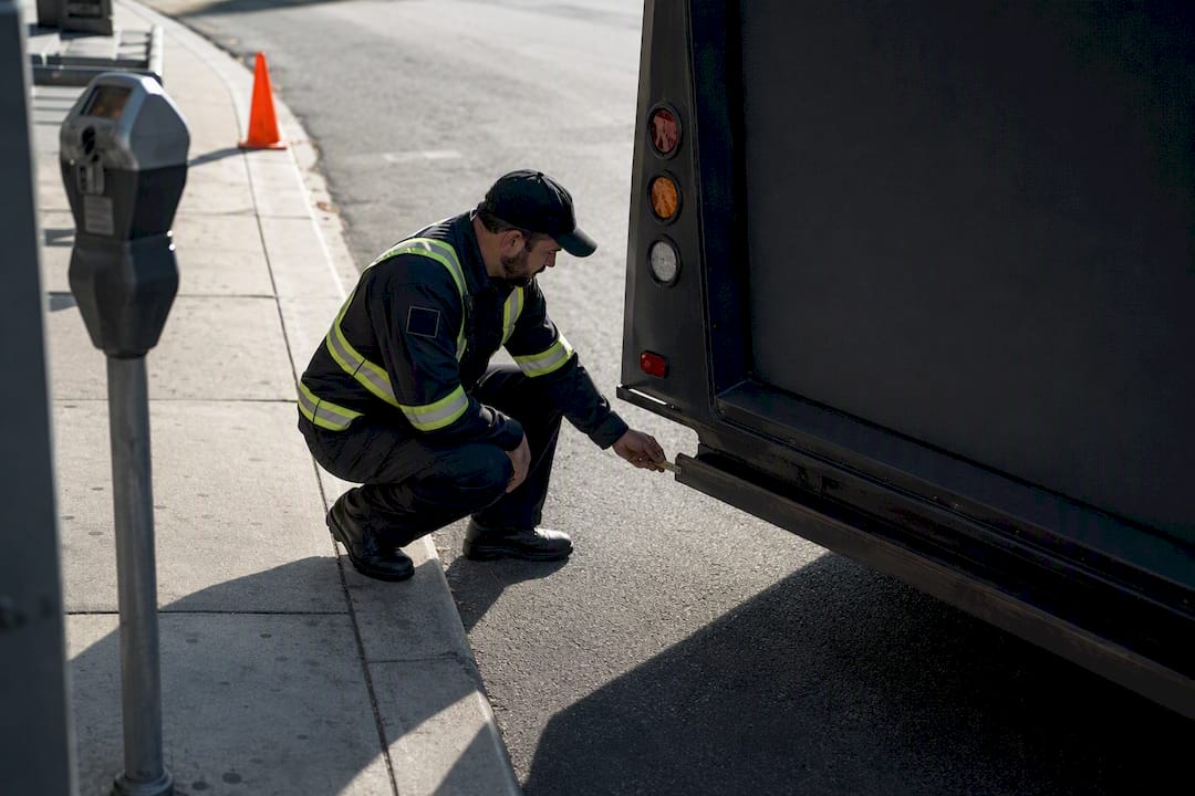 Inspector checking anonymous billboard vehicle compliance