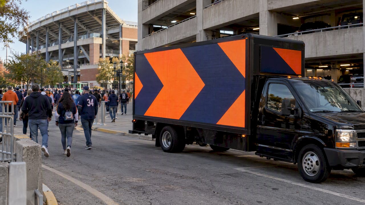 Mobile LED billboard beside stadium arrivals