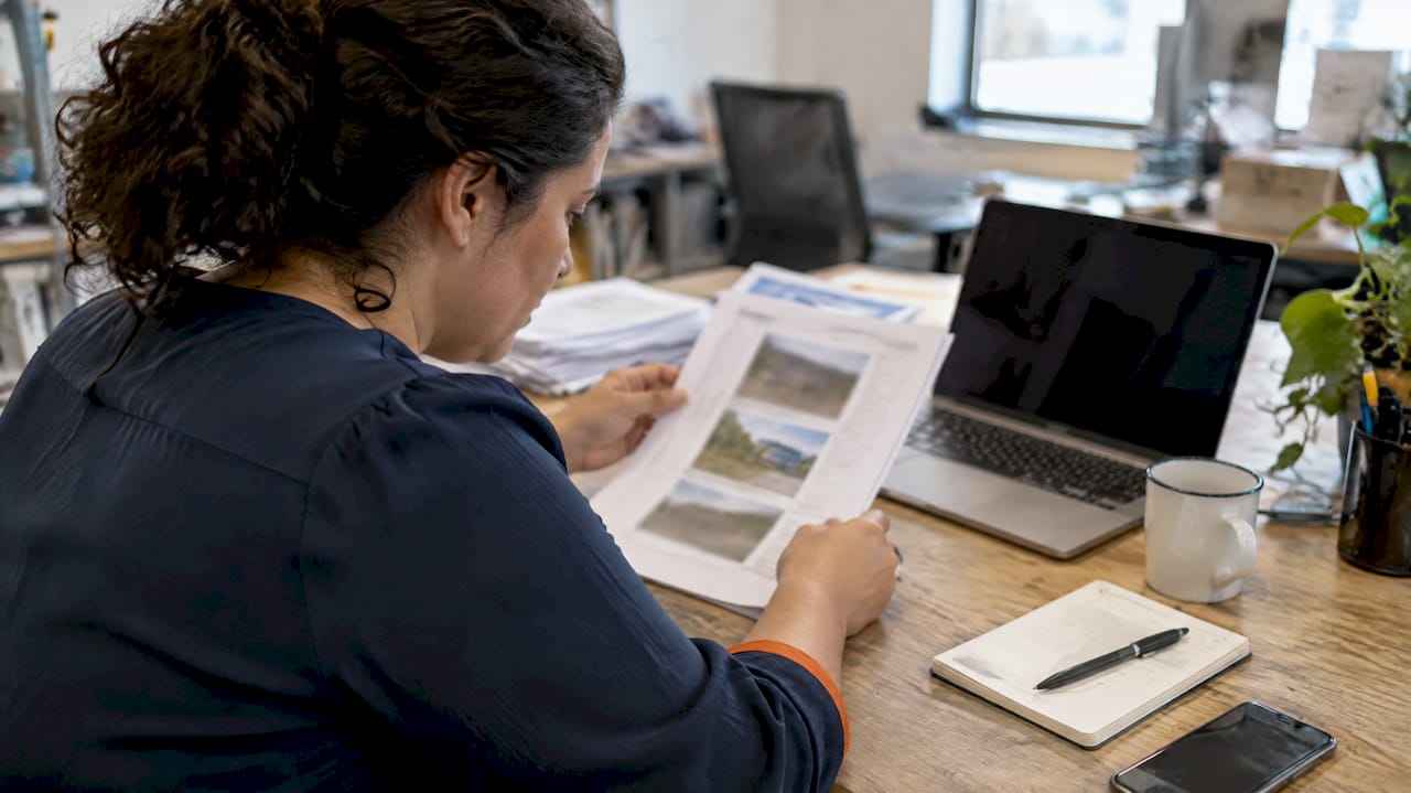 Buyer checks an OOH proof report
