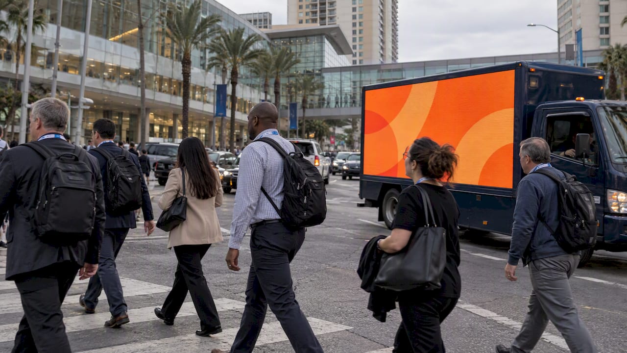 Mobile billboard passing convention attendees